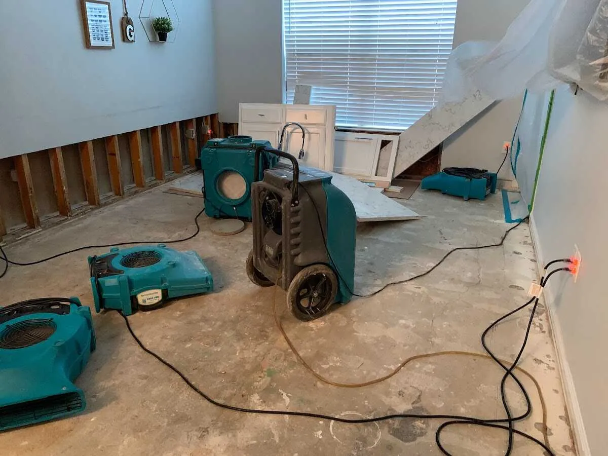 Dehumidifier in flood-cut room for Water Damage Restoration in Clarendon Hills